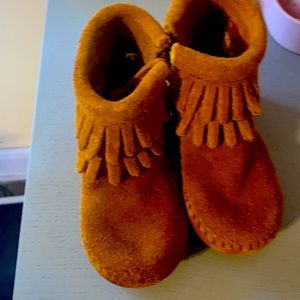Never worn Minnetonka,fringe booties. Toddler size 4